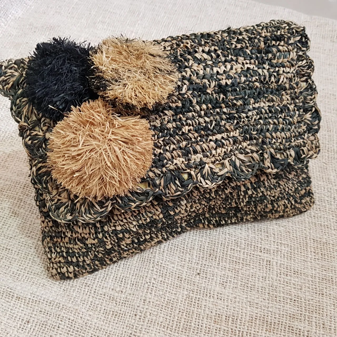 Black & Brown Woven Straw Grass Fold Clutch With Pom Poms