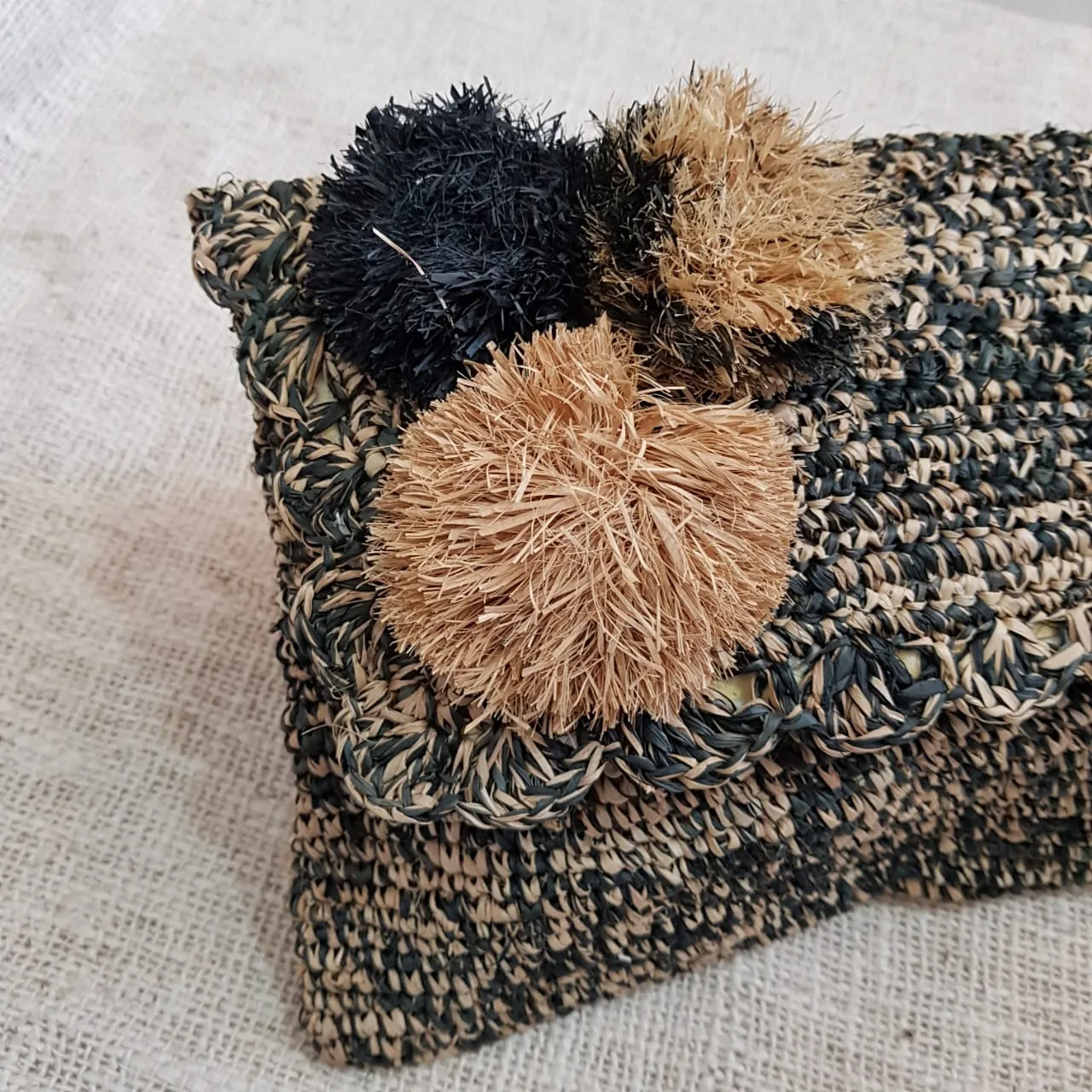 Black & Brown Woven Straw Grass Fold Clutch With Pom Poms