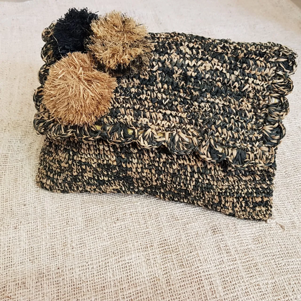 Black & Brown Woven Straw Grass Fold Clutch With Pom Poms